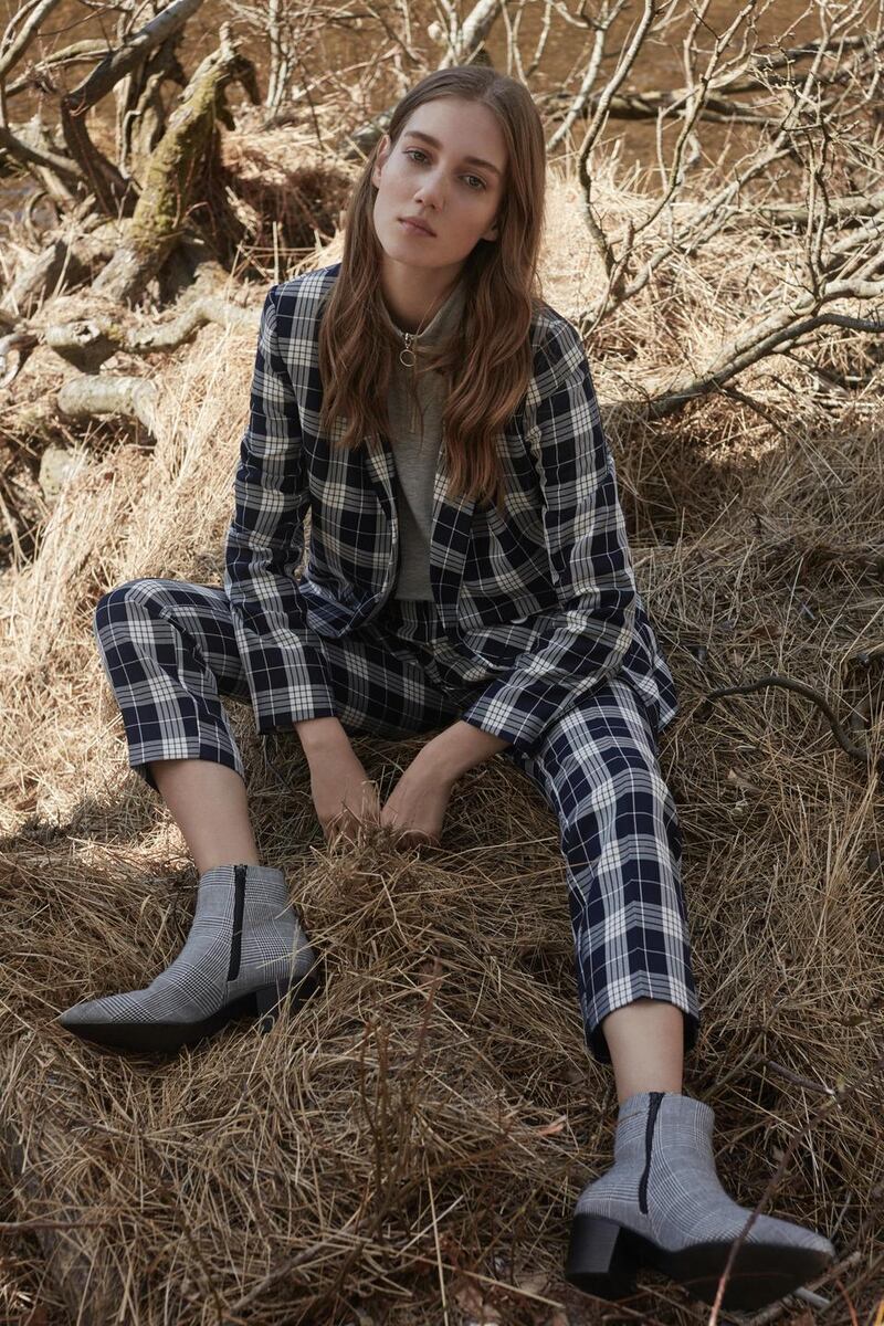 Blazer €22, jumper €11, trousers €16, boots €19.