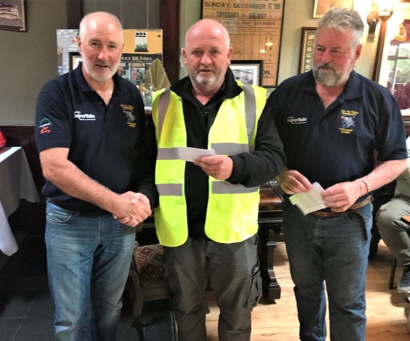 Neil O’Meagher (centre) team leader with Mask and Corrib Rescue Team, accepting a cheque for €1,400 from committee members Tom Sweeney (right) and Pat Winning.