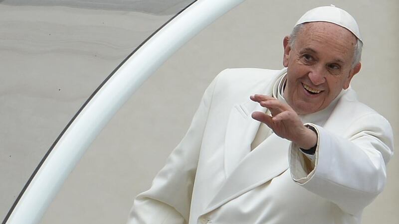 Pope Francis greets the crowd from the popemobile after the Easter Mass   in the Vatican. Photograph: Filippo Monteforte/AFP/Getty Images.