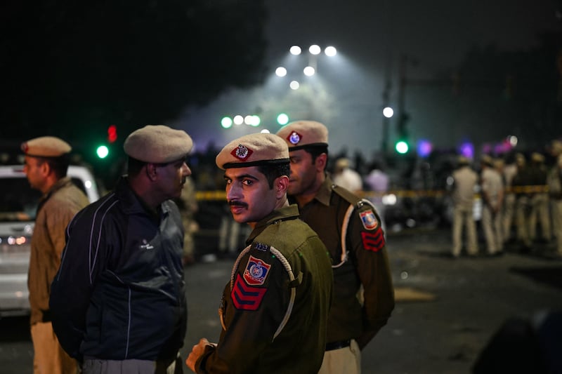 Police gathered to secure the blast site after an explosion near the Red Fort in the old quarters of Delhi. Photograph: Sajjad Hussain/ AFP/ via Getty Images