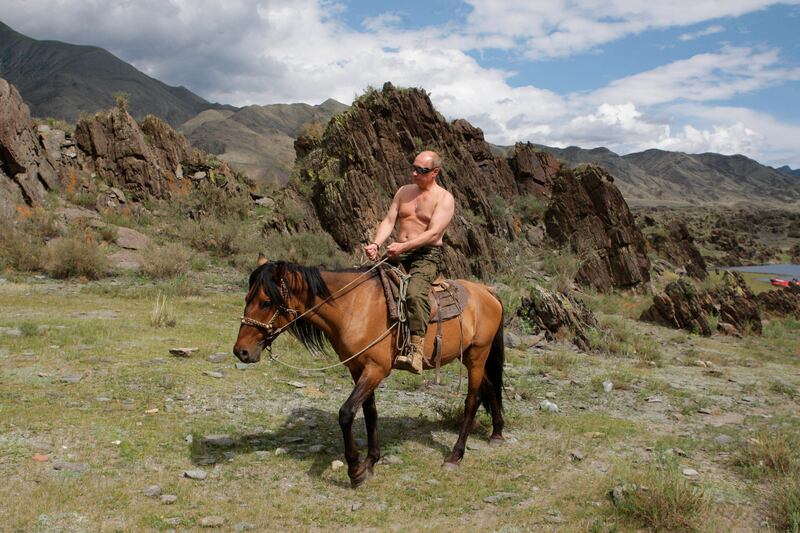 A bare-chested Vladimir  Putin. Photograph: 
