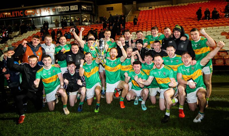 Glen celebrate with the trophy after the game at the Athletic Grounds, Armagh. Photograph: Ryan Byrne/Inpho