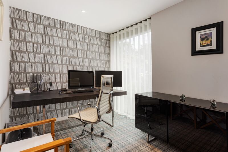 One of the four bedrooms is used as a study