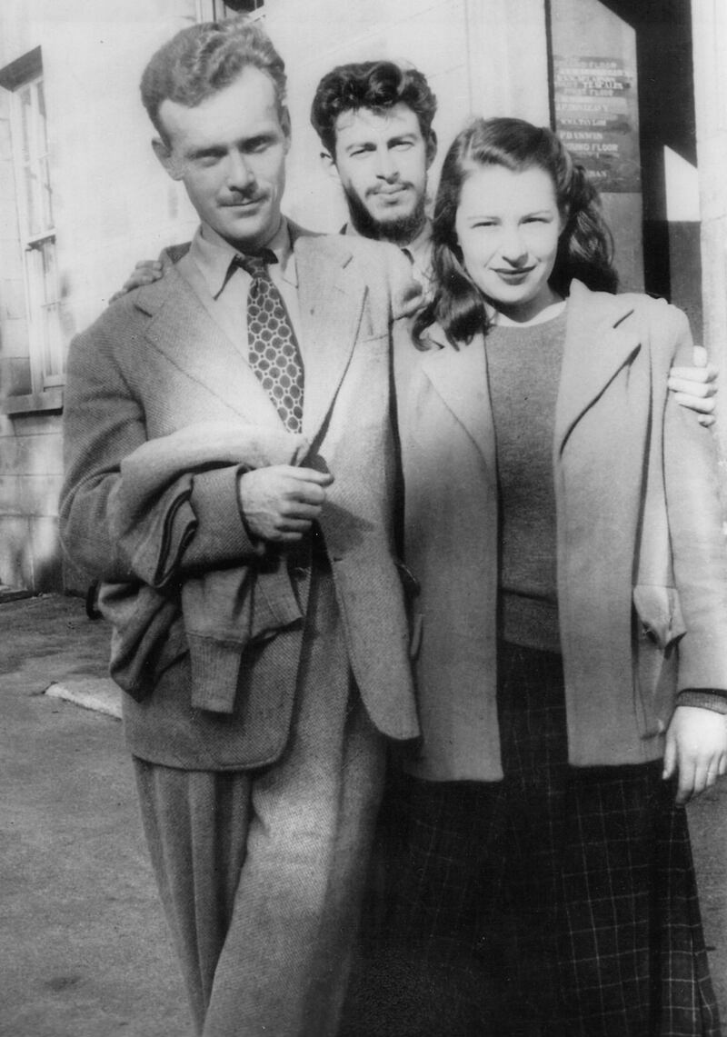 JP Donleavy peers over the shoulders of newlyweds Gainor and Petra Crist, who were also studying at Trinity. Courtesy: JP Donleavy archive