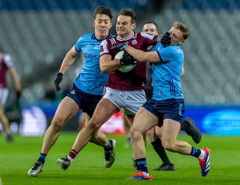 Dublin’s Killian McGinnis and Cian Murphy with Cillian McDaid of Galway. Photograph: Morgan Treacy/Inpho