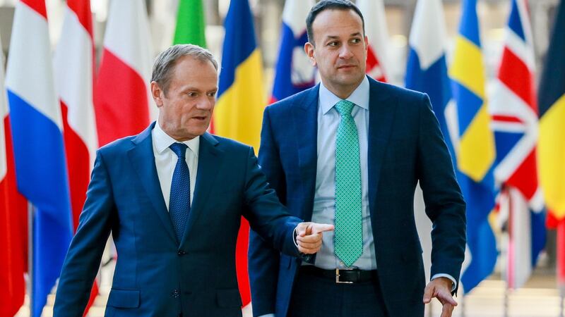 Taoiseach Leo Varadkar (right)  is welcomed by European Union Council president Donald Tusk ahead of a meeting to discuss Brexit in Brussels on Thursday. Photograph: EPA