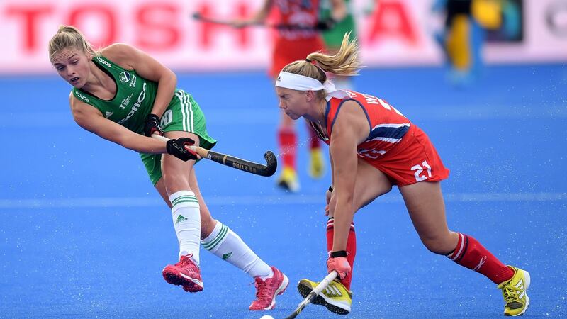 Chloe Watkins in action against Nicole Woods of the USA. Photograph: Joe Toth/Inpho