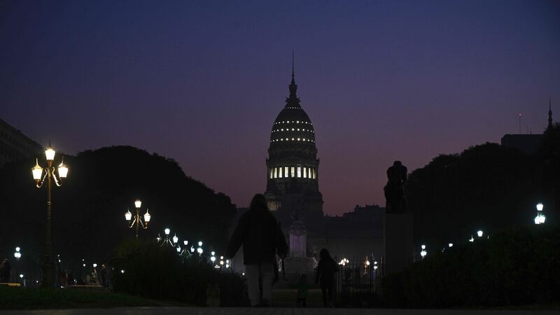 Argentina’s congress at dusk during the lockdown imposed by the government. Photograph: Juan Mabromata/AFP via Getty
