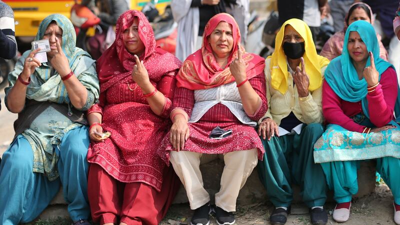 Voters show their ink-marked fingers after casting their votes during the first phase of the Uttar Pradesh state assembly elections in Dadri, Uttar Pradesh, on Thursday. Photograph: Harish Tyagi/EPA