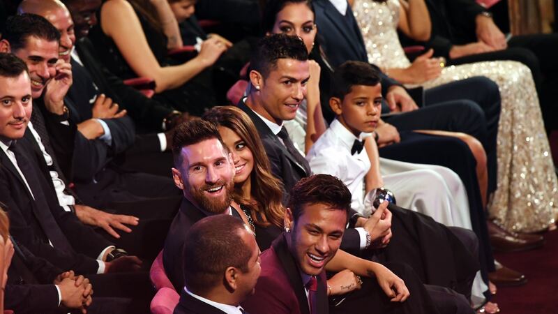 Neymar; Lionel Messi and his wife Antonella Roccuzzo; Cristiano Ronaldo and his son Cristiano Ronaldo Jr. and girlfriend Georgina Rodriguez in London. Photograph: PA