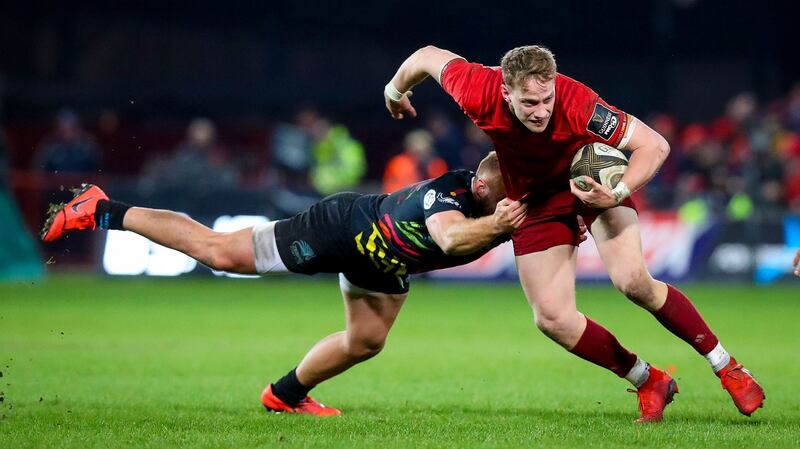 Munster’s Mike Haley with Giulio Bisegni of Zebre in their Guinness Pro14 match at Thomond Park, Limerick. Photograph: Tommy Dickson/Inpho
