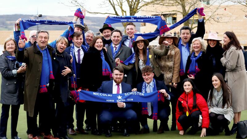 Members of the Niccolai Schuster Horse Racing Club after their horse Ellie Mac rode in the Trulls House Stud Mares Novice Hurdle at Cheltenham in March.  Photograph: James Crombie/Inpho