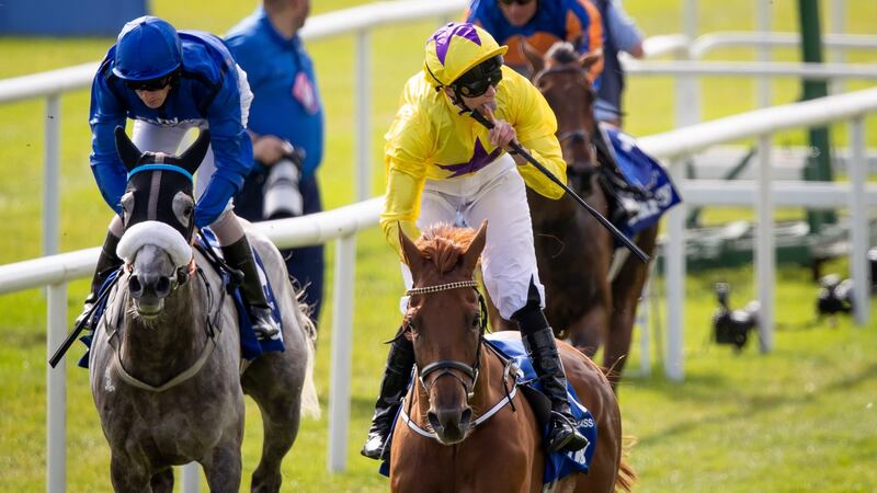 James Doyle on Sea of Class celebrates winning the Darley Irish Oaks at the Curragh. Photograph: Morgan Treacy/Inpho