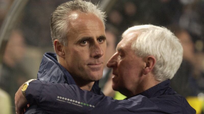 Mick McCarthy  gets a hug from Mick Byrne during the European Championship Qualifier Group Ten match between Republic of Ireland and Switzerland at Landsdowne Road in Dublin,  2002. Photograph:  Ross Kinnaird/Getty Images
