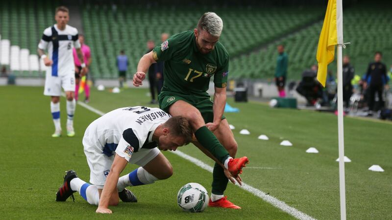 Finland defender Leo Vaisanen is pressed by Ireland’s Aaron Connolly. Photograph: Lorrain O’Sullivan/Getty/AFP