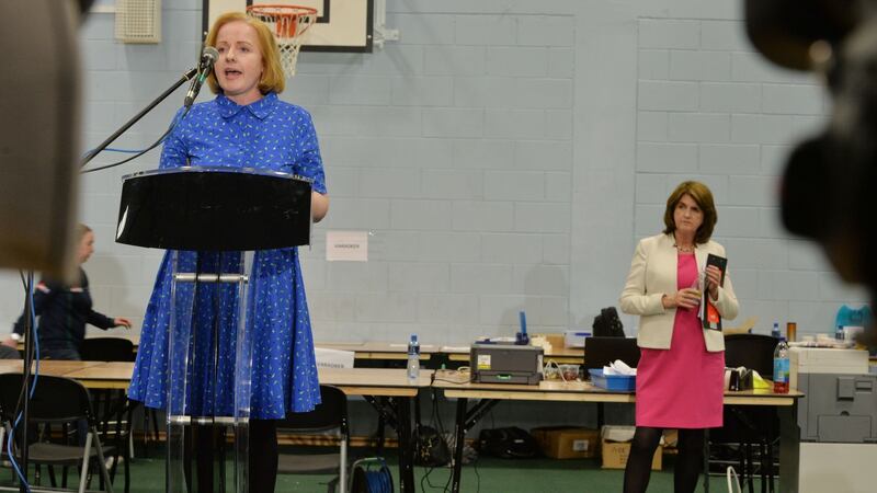 Socialist TD Ruth Coppinger makes her acceptance speech in Dublin West as Tánaiste Joan Burton looks on. Photograph: Alan Betson