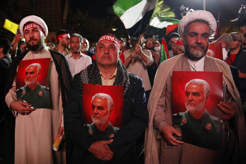 Iranians carry pictures of slain Revolutionary Guards commander Qassem Soleimani in Tehran on October 7th last, at a gathering to express solidarity with Palestinians on the day of Hamas's attack on Israel. Photograph: AFP via Getty Images