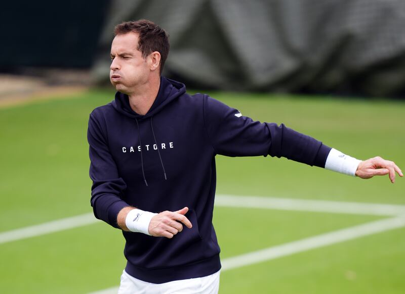 Andy Murray warming up at Wimbledon on Wednesday. Photograph: John Walton/PA Wire