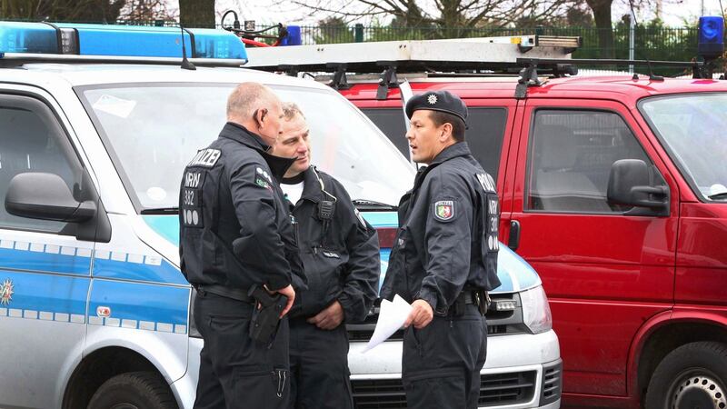 Police officers in Aachen, Germanywhere three people were arrested in connection with the Paris attacks. Photograph: Ralf Hoeger/EPA