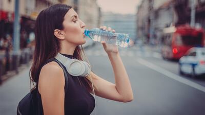 After a day or two of feeling your organs are waterlogged, and going to the bathroom every three minutes,  drinking 2 litres of water a day will soon feel like second nature