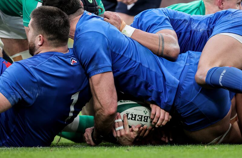 Grounds for improvement: Ireland’s Conor Murray is prevented from touching the ball down behind the French try line. Photograph: Billy Stickland/Inpho