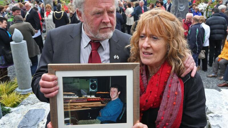Denis and Martina Goggin, founders of the National Organ Donor Commemorative Garden, with a photograph of their late son Eamonn whose organs were donated following a car accident in 2006, at the opening of the Garden yesterday. Photograph: Joe O’Shaughnessy.