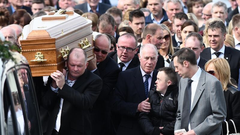 Concepta Leonard's son (centre right in jacket) Conor was treated in hospital for stab wounds. Photograph: Colm Lenaghan/Pacemaker