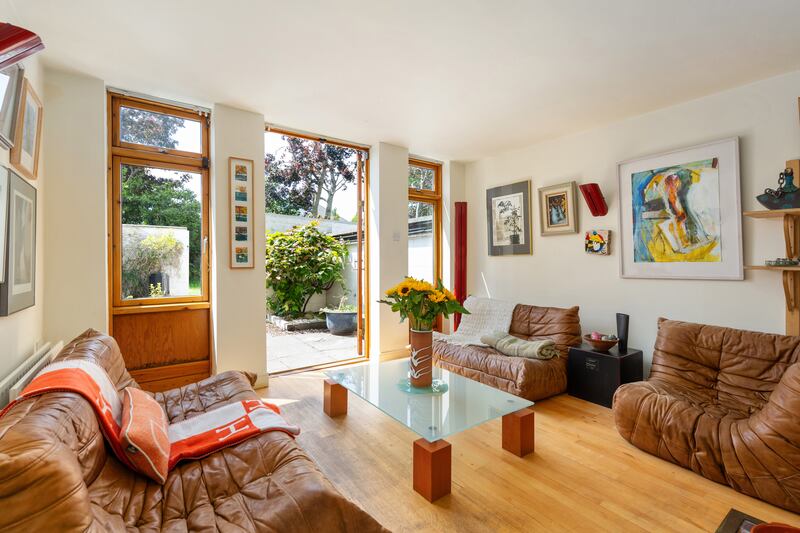 Living room opens to the courtyard