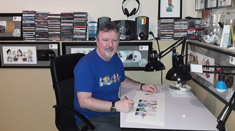 Cartoonist John Kennedy who lives in Nova Scotia with his family