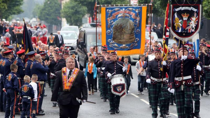 Protestant members of the Orange Order take part in a July Twelfth parade  in Belfast. Photograph: Paul Faith/AFP/Getty Images.
