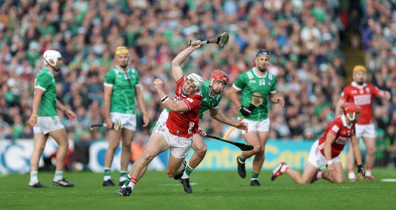 Cork's Tommy O’Connell in action against Limerick's Barry Nash. Photograph: Laszlo Geczo/Inpho