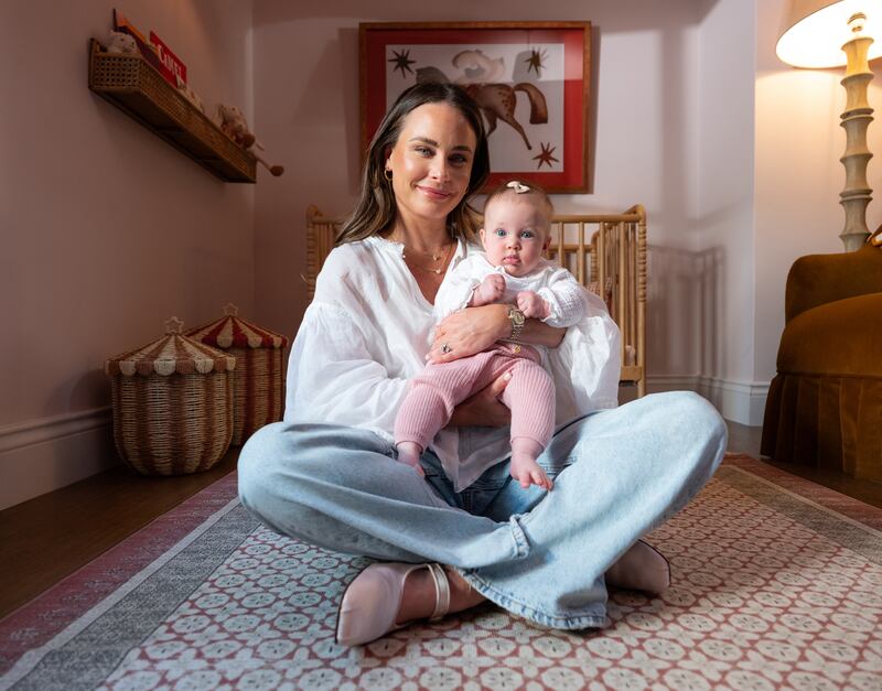 Jodie Wood and her daughter, Sadie, in her home in north Co Wicklow