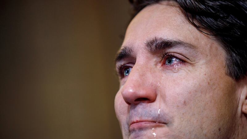 Canada’s prime minister, Justin Trudeau, sheds tears as he speaks with media in Ottawa about the  death of Tragically Hip singer Gord Downie. Photograph: Adam Scotti/Canadian prime minister’s office handout/Reuters