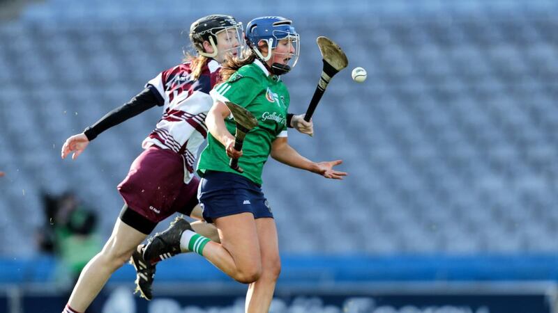 Sarsfields’ Sheena Warde and Louise Dougan of Slaughtneil in the All-Ireland Club Championship Senior Camogie Final at Croke Park on Sunday. Photograph: Laszlo Geczo/Inpho
