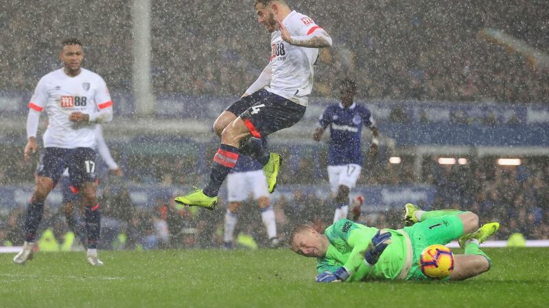 Jordan Pickford makes a save from Ryan Fraser. Photo: Mark Robinson/Getty Images