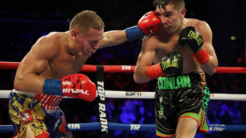 Vladimir Nikitin catches Michael Conlan during his defeat in New York. Photograph: Al Bello/Getty