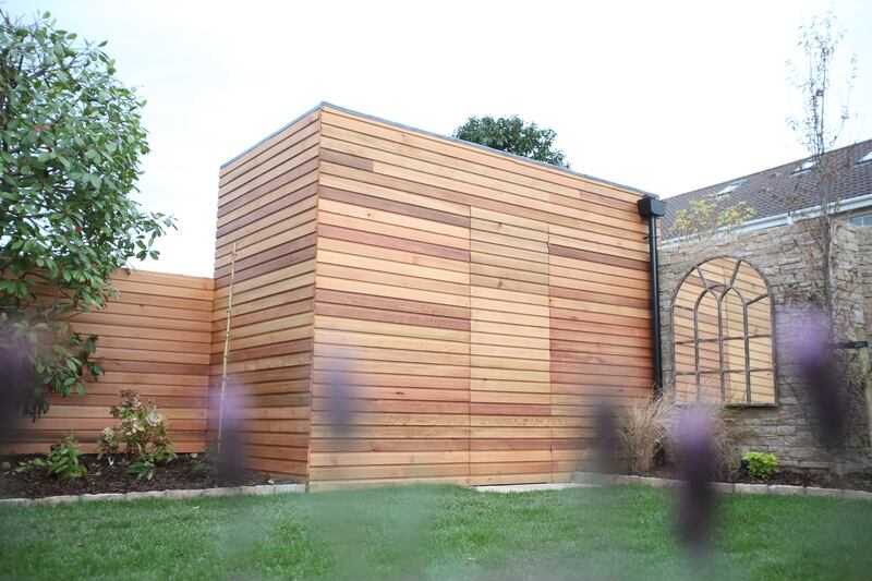 A laundry room doesn’t have to be an elaborate structure; a shed close to the main house can work very well