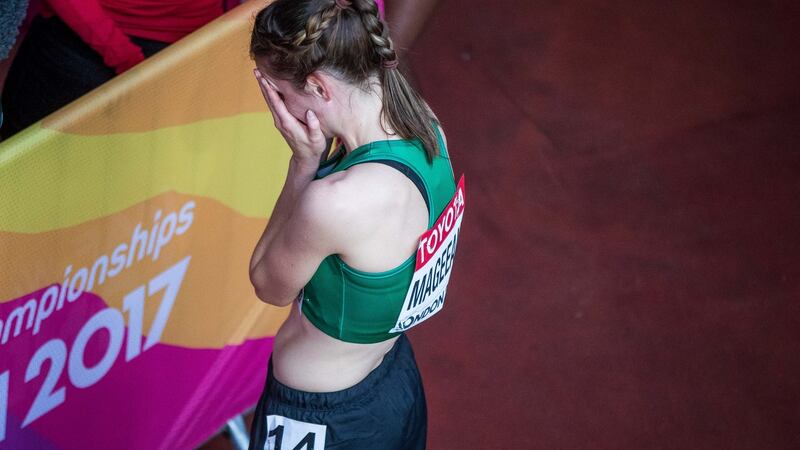Mageean holds her head in her hands after the race. Photo: Morgan Treacy/Inpho