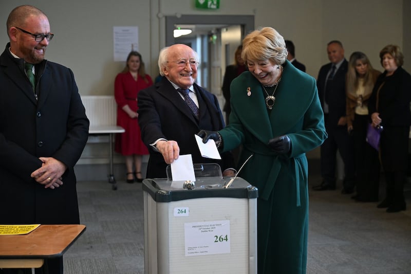 Irish President Michael D. Higgins (L) and his wife, Sabina, cast their vote in the Irish presidential election at St Mary's Hospital in Phoenix Park in Dublin, Ireland, 24 October 2025. Photograph: Bryan Meade/EPA