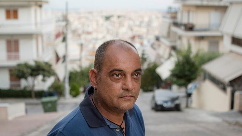 Dimitris Zafiriou, a specialist in metal building infrastructure, in Keratsini, a working class neighbourhood of Piraeus. When Zafiriou landed a coveted full-time job two months ago, the salary was only half what he earned before Greece’s debt crisis. Photograph: Eirini Vourloumis/The New York Times