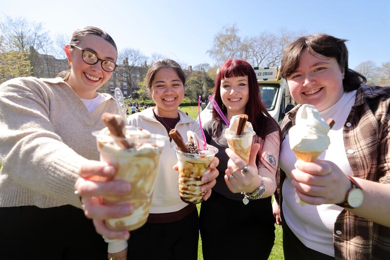Eimear Hughes, Offaly, Ninna Montes, Kildare, Alyssa Lennon, Roscommon and Katie O’Sullivan from Wexford, lunch time visitors to Dublins Merrion Square enjoy blazing sunshine, during Ireland's warm weather spell. Photograph: Alan Betson / The Irish Times

