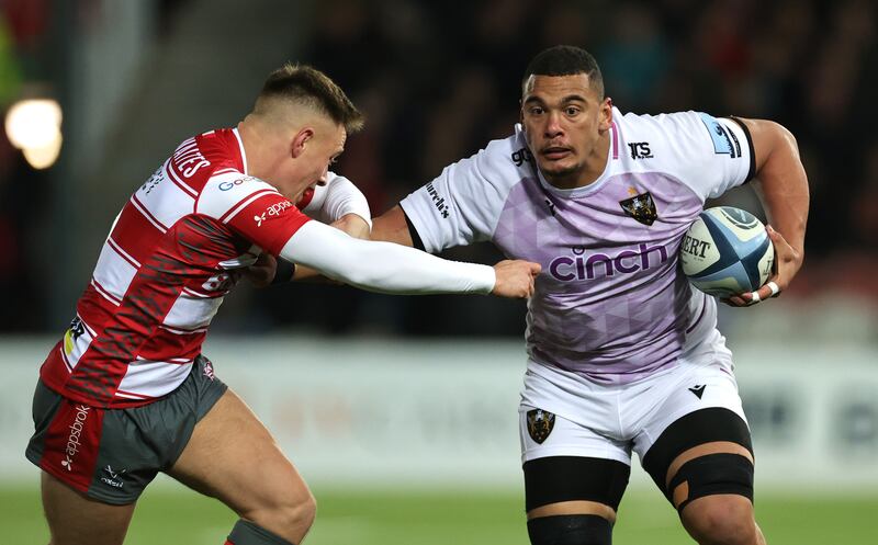 Juarno Augustus of Northampton Saints is held by Gloucester's Stephen Varney at Kingsholm Stadium on December 3rd, in Gloucester, England. Photograph: David Rogers/Getty Images