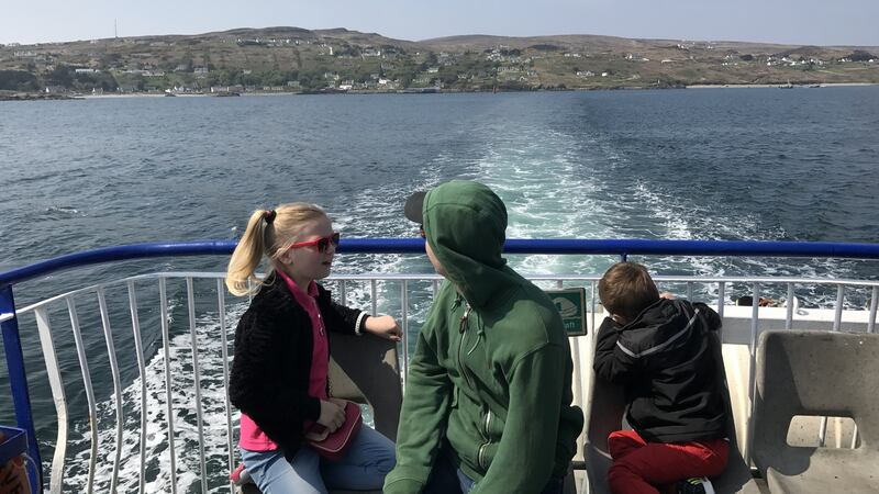 Mia, Sam and Logan on the boat trip home
