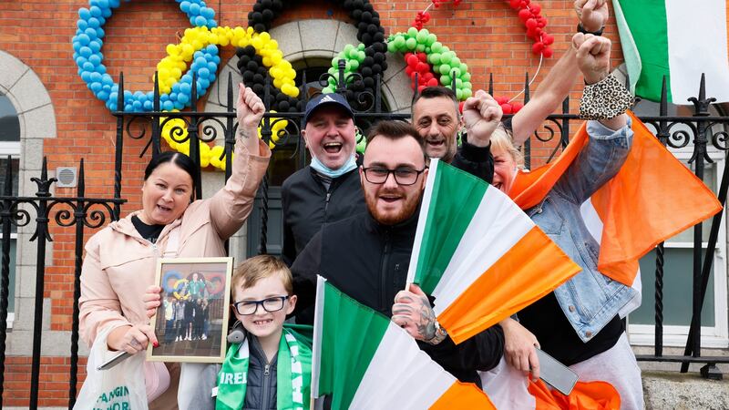 Members of the Russell Family welcoming Olympic gold medal winning boxer Kellie Harrington back to Portland Row in Dublin 1 on Tuesday. Photograph: Alan Betson