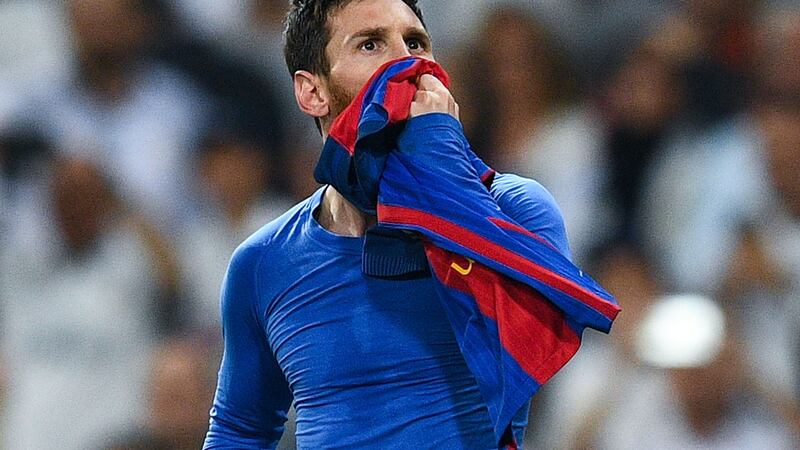 Lionel Messi celebrates after scoring his team’s third goal at Santiago Bernabeu. Photograph: David Ramos/Getty Images
