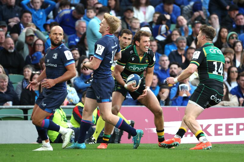 Northampton Saints' James Ramm (centre) celebrates scoring his side's fifth try of the game against Leinster. Photograph: Damien Eagers/PA