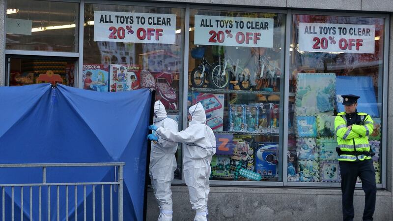 Gardaí at the scene of a gun attack on Bridgefoot Street, Dublin. Photograph: Colin Keegan/Collins Dublin