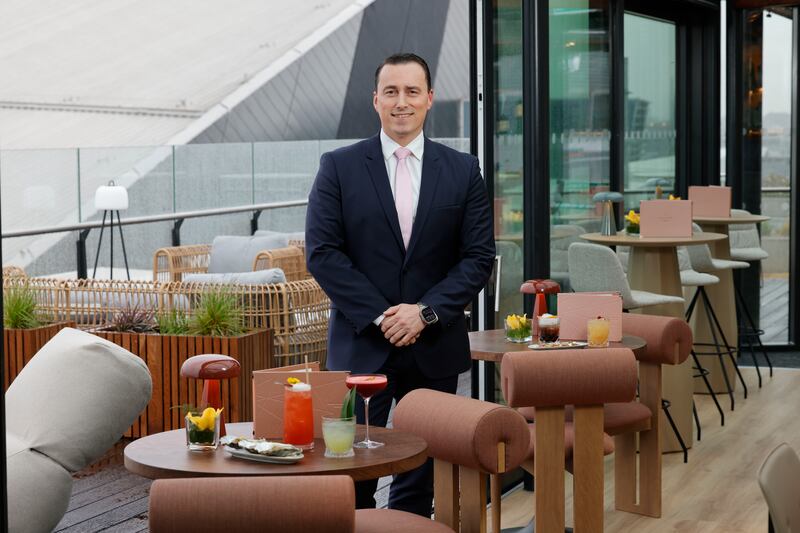 Ludo de Jong with the Rooftop's signature cocktails