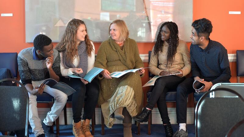 Anne Walsh, Intercultural and Equity Officer of the National Youth Council of Ireland, chatting with speakers Emmanuel Samuel, Elina Feldmane, Jennifer Samuel and Melvin Jumungal. Photograph: Alan Betson