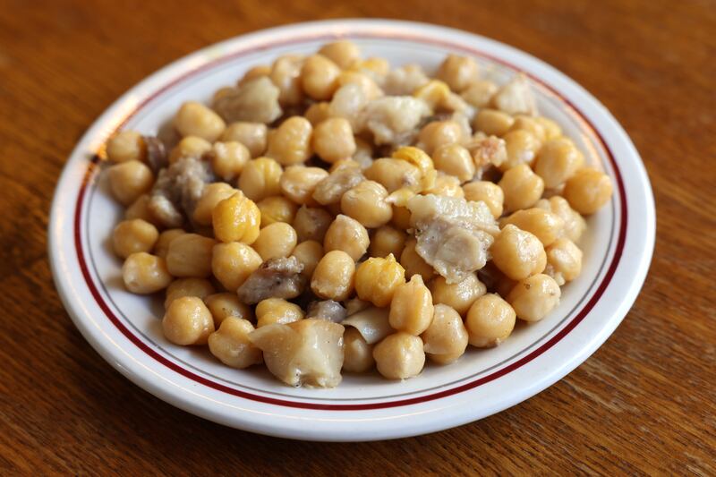 Chickpeas and confit pig. Photograph: Dara Mac Dónaill